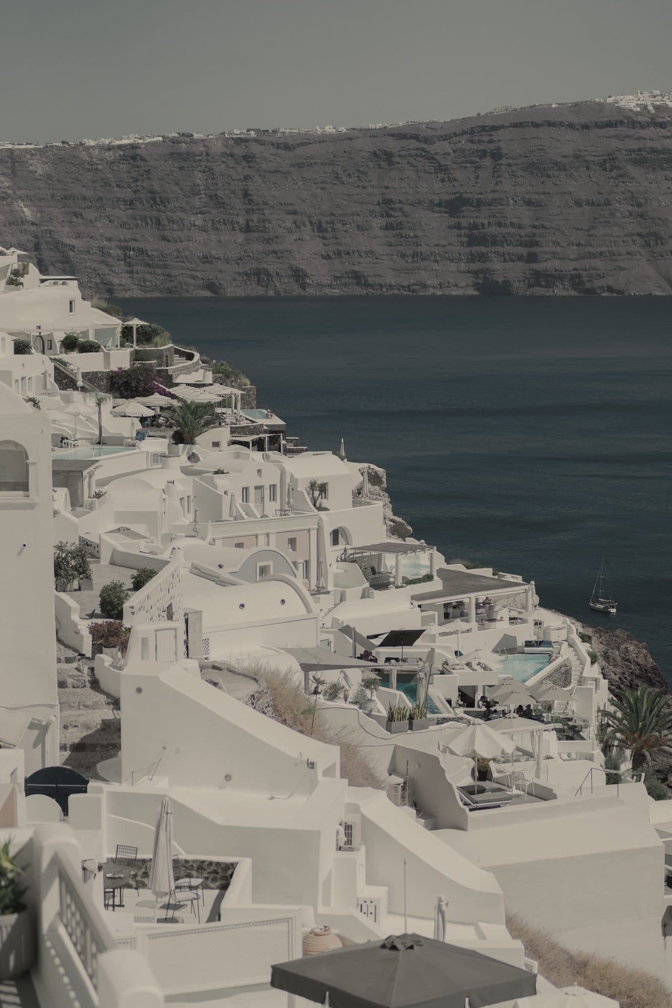 Whitewashed terraces of Oia stepping down to the Santorini caldera
