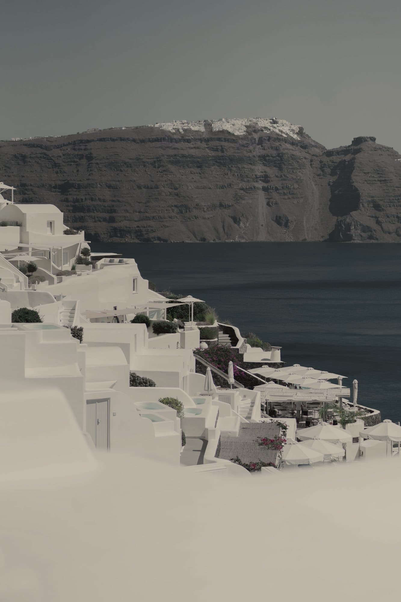 Whitewashed houses on the cliffs of Santorini above the caldera